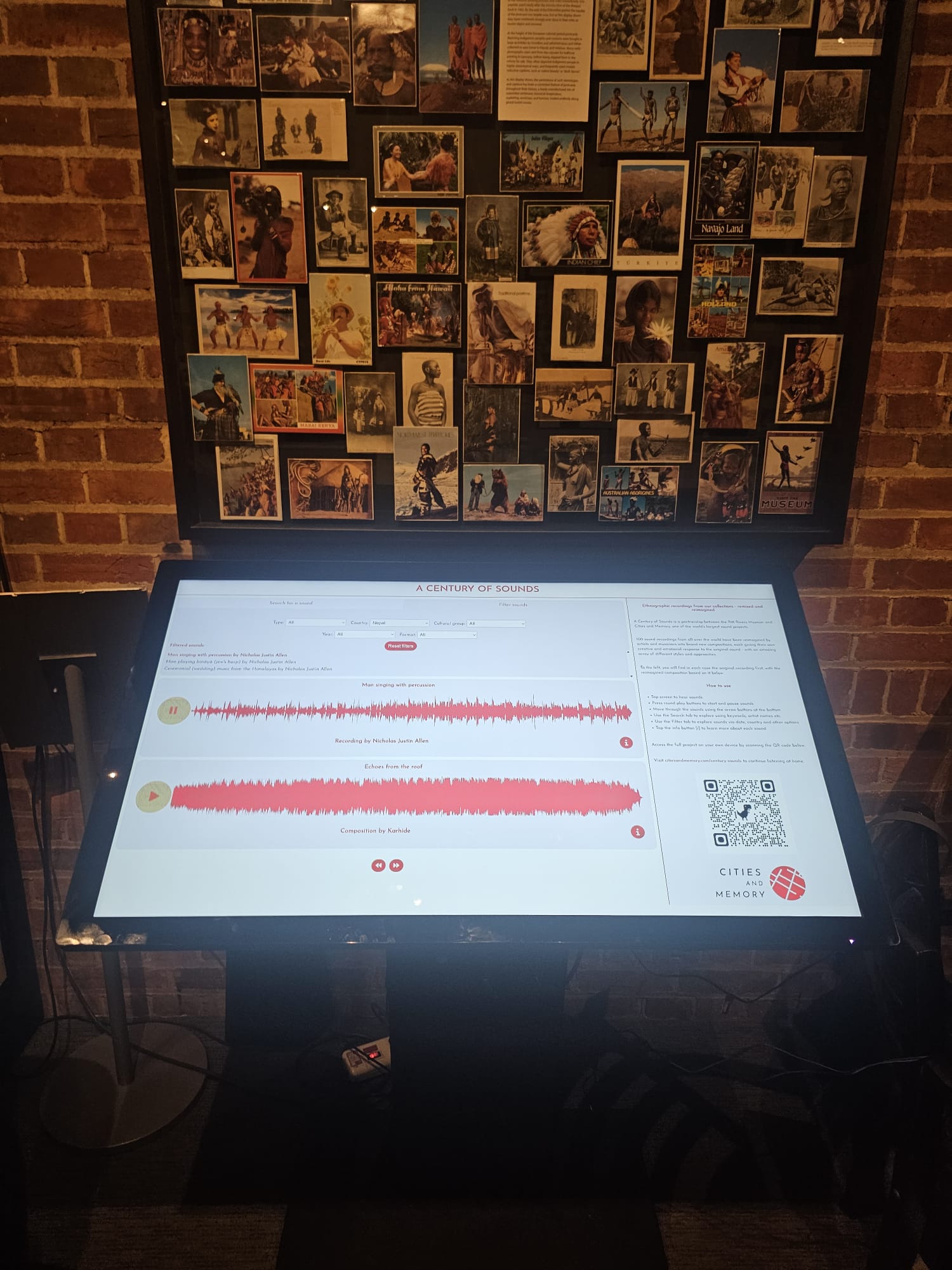Museum Visitor interacting with the tactile audio screen